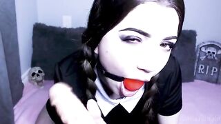 Wednesday Addams gets fucked by a dildo and receives a cum facial in a steamy session