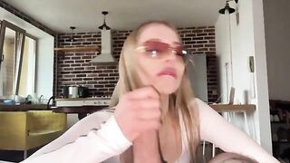 A pretty woman has sex with her glasses-wearing guy