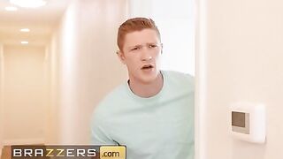 Mellanie Monroe gets stuck while setting up the laundry rack and her stepson helps her out