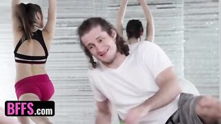 A yoga enthusiast is having fun with his yoga teacher and classmates