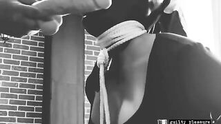 Sex tape with a bound slave getting fucked in the mouth and pussy with a big dildo
