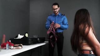 The agent found a toy in the bag and took me to his office