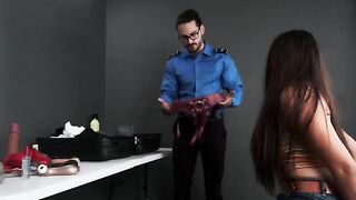 The agent found a toy in the bag and took me to his office