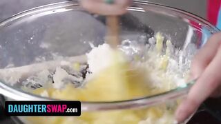 Two stepdaughters, Jill and Arya, are busy in the kitchen, engaging in some playful banter