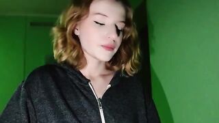 A couple gets intimate in the entrance while parents are at home