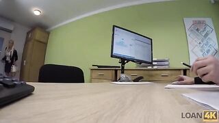A business lady is trying to get a loan from the bank for some money