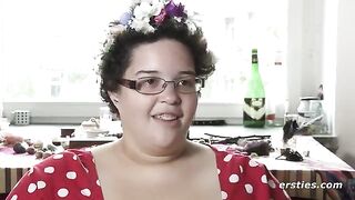 An amateur girl caresses her shaved pussy with her fingers in a sensual scene