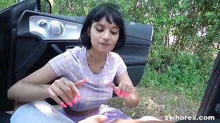 A young prostitute is looking for clients right in the street