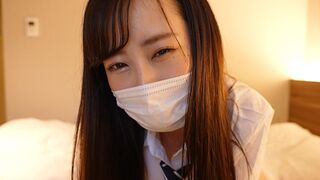 A Japanese girl in a sailor suit masturbates the guy’s cock with her hand