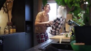 A couple has an intimate moment in the kitchen, just like a scene from Homemade Porn by Wifebucket