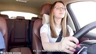 A hot stepmom is giving driving lessons to her stepson in the car
