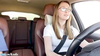 A hot stepmom is giving driving lessons to her stepson in the car