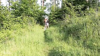 Babe fucks with a young guy in the forest, showcasing risky public sex