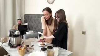 The guy came to the girl, who was cooking Russian syrniki