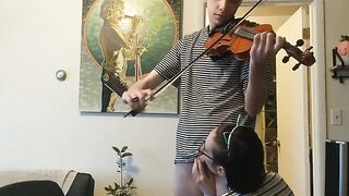 Girl trying to practice violin, but her boyfriend is jerking off