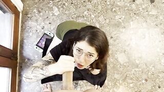 A gamer girl gives a blowjob to a guy who plays video games