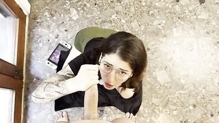 A gamer girl gives a blowjob to a guy who plays video games