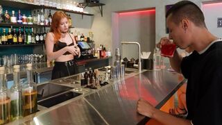 The customer went down on the hot bartender's lingerie in a sensual scene