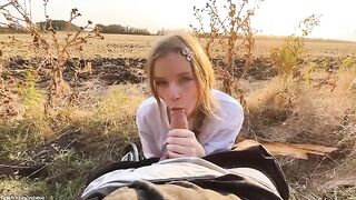 A blowjob in the park from a beautiful Russian blonde, captured at sunset
