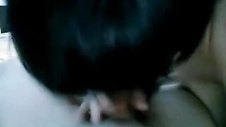 A drunk brunette woman woke up her sleeping husband with her blowjob skills