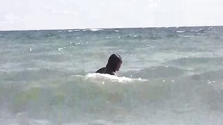 Two girls are not shy to get naked on the beach