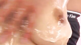 A Japanese girl massages her boyfriend's dick with oil and handjob