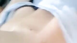 A half-naked girl tells lies and caresses her body