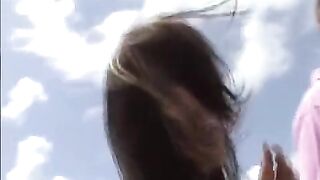 The young girl practices her skills with a hairy guy