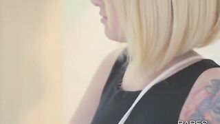 Tattooed girl masturbating herself and reaching orgasm with glasses