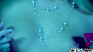 The blonde girl plays with a large dildo and brings herself to pleasure