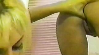 A couple of girls are having fun in the shower with toys