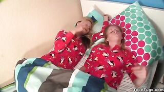 Two girls are jerking a guy's dick with their hands and mouths