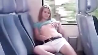 On the bus, a chick galls ironing her twat
