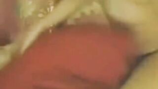 Asian beauty masturbating in front of a webcam