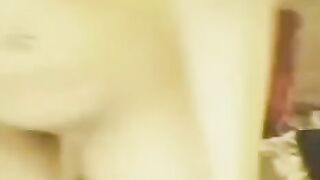 Asian beauty masturbating in front of a webcam