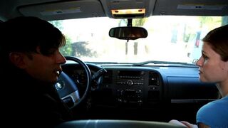 A girl showed her tongue to the guy in the car and unbuttoned her pants