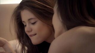 Lesbian beauties lick each other’s pussies and reach intense orgasms in this steamy bedroom scene