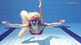 A hot and steamy naked swim in the pool