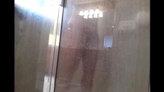 A guy washed his body in the shower, not suspecting a camera
