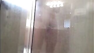 A guy washed his body in the shower, not suspecting a camera