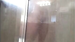 A guy washed his body in the shower, not suspecting a camera