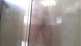A guy washed his body in the shower, not suspecting a camera