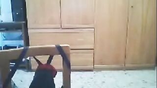 A woman has sex in front of her husband's webcam