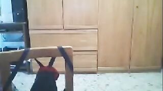 A woman has sex in front of her husband's webcam