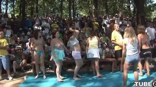 A girl is fucking with someone in the forest