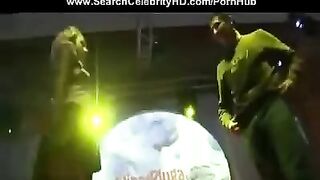 A girl is fucking in the club during a porn show