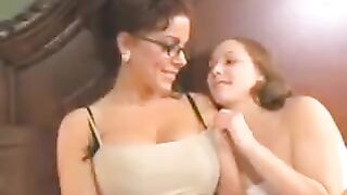 A mother introduces her daughter to lesbian sex