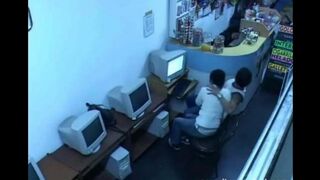 A guy almost fucks with a girl in the internet cafe webcam