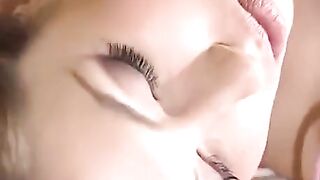 A busty woman licks the pussy of a young guy in this hot video