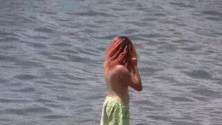 Nudists are having fun on the Crimean coast
